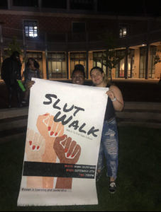 women holding slut walk sign