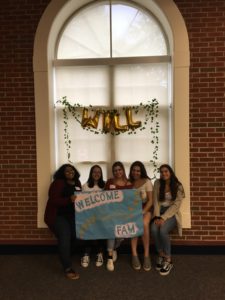 group holding sign